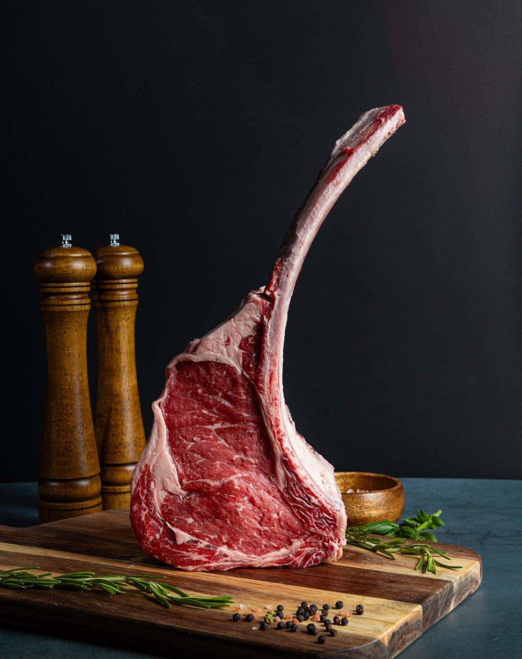 raw, bone-in meat on a cutting board